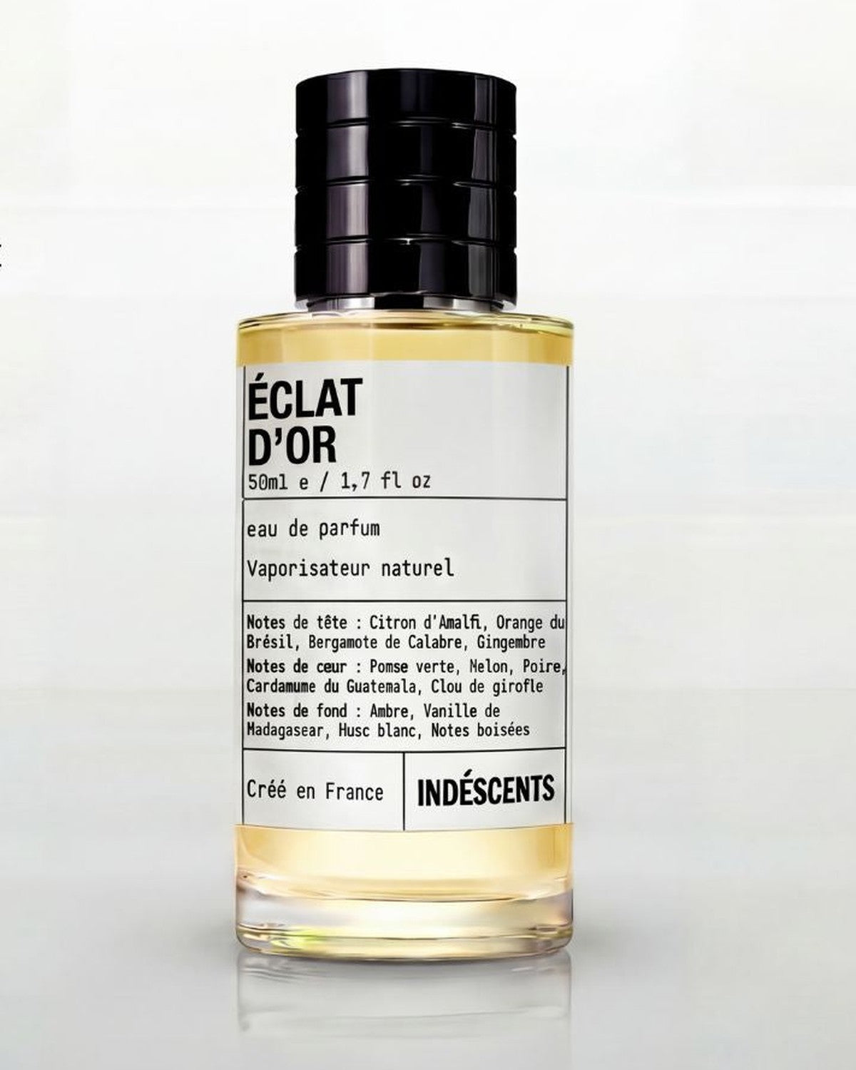 Flacon Éclat d'Or d'Indéscents, eau de parfum fruitée et ambrée inspirée de Xerjoff Erba Gold